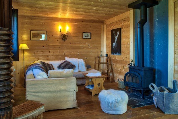 View into a hut furnished in Alpine style