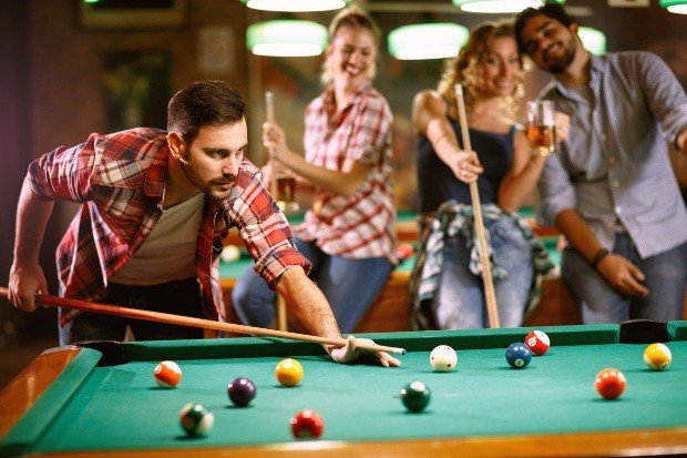 People play billiards - set up a party cellar